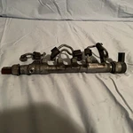 2009-14 Vw Passat Crk Fuel Rail 03L130089J. Fixed Price $64.99.