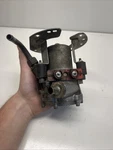 Original 230SL Mercedes Fuel Pump With Mounting Bracket. Fixed Price $275.00.